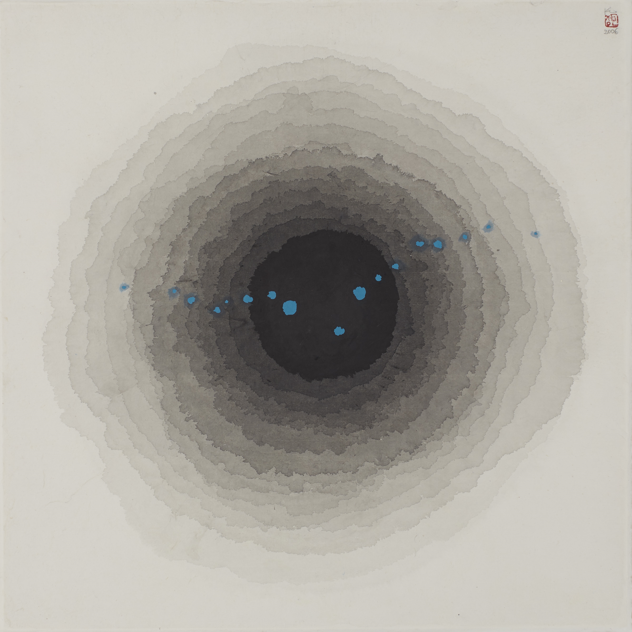 Ink circles that become darker and darker as they move towards the center of a page with a series of blue ink dots stretching horizontally across the work.
