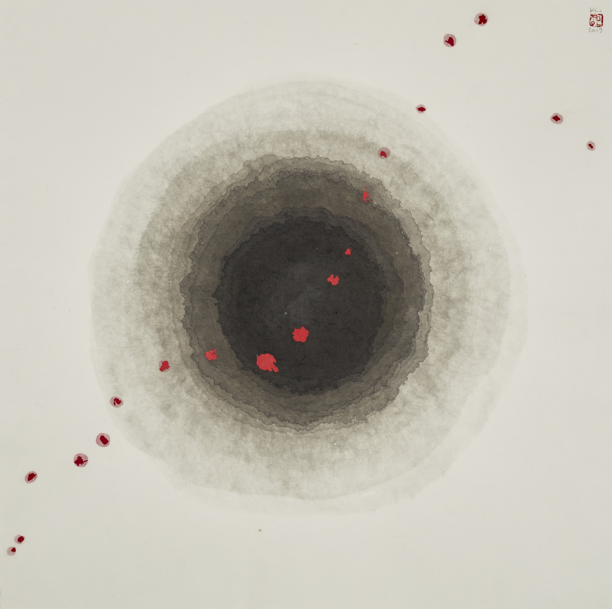 Ink circles that become darker and darker as they move towards the center of a page with a series of red ink dots stretching diagonally across the work.