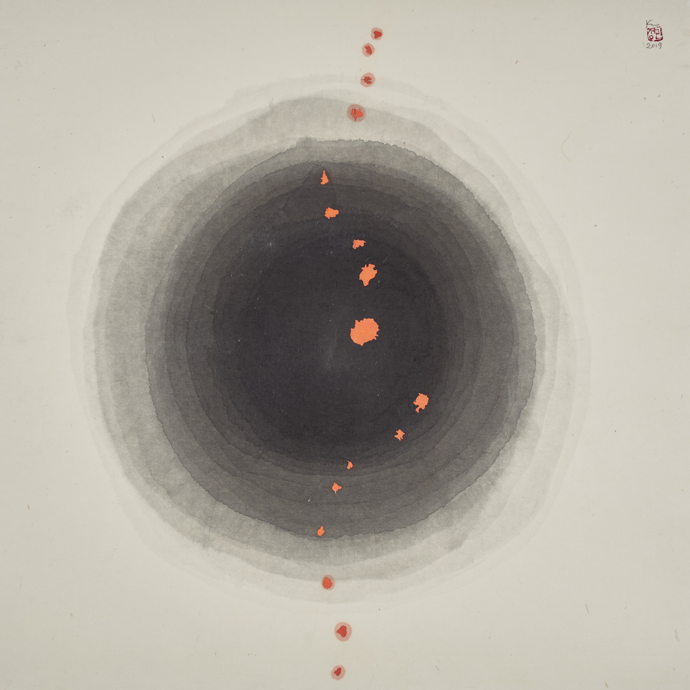 Ink circles that become darker and darker as they move towards the center of a page with a series of orange ink dots stretching vertically across the work.