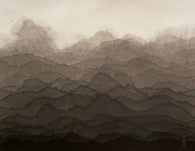 Mountains painted with ink.