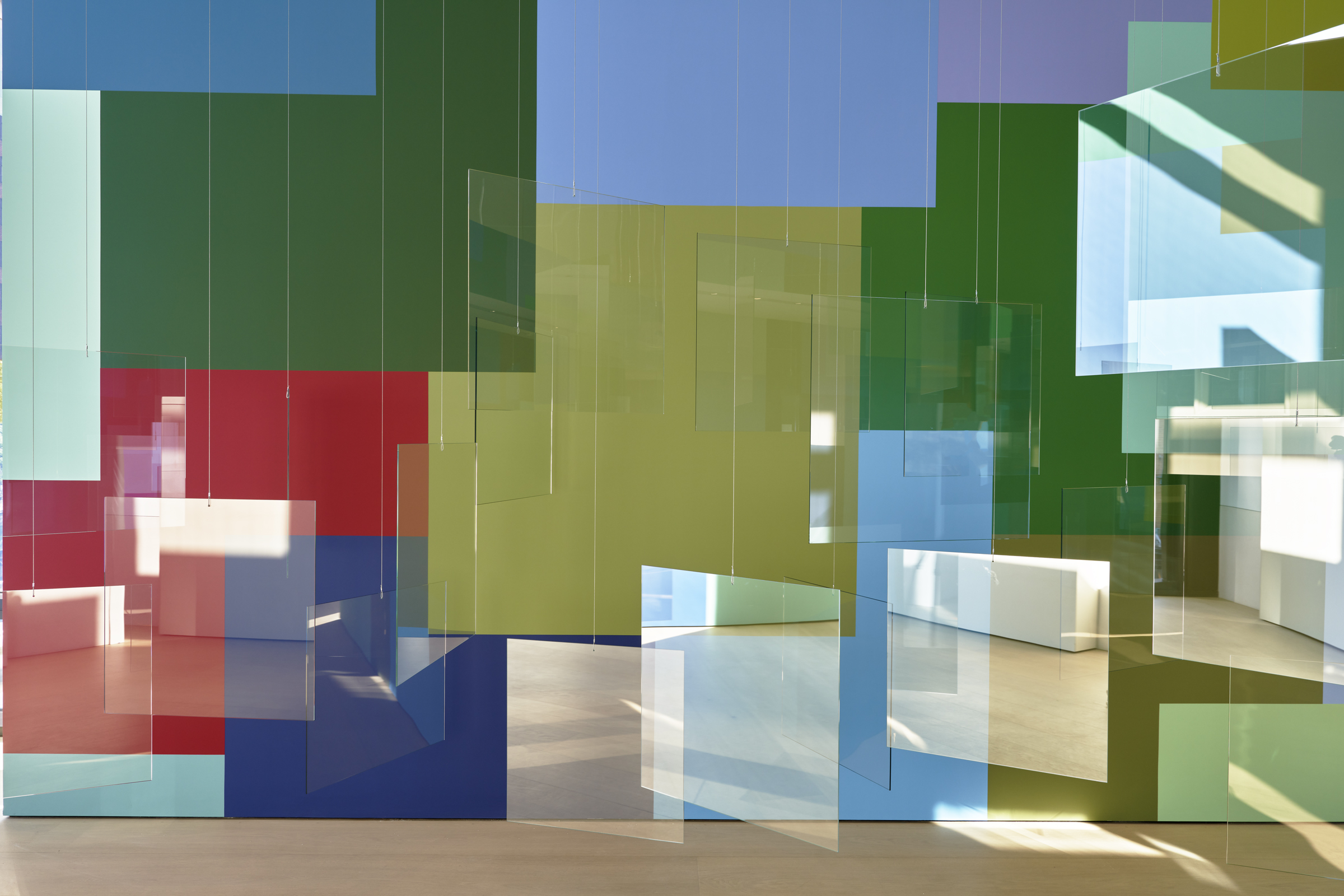 The walls painted with squares of blue, green, purple, yellow, and red. There are over 100 sheets...